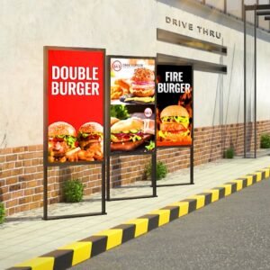 There are four XE3P displays in the drive-thru zone at the burger place | digital signage lcd display