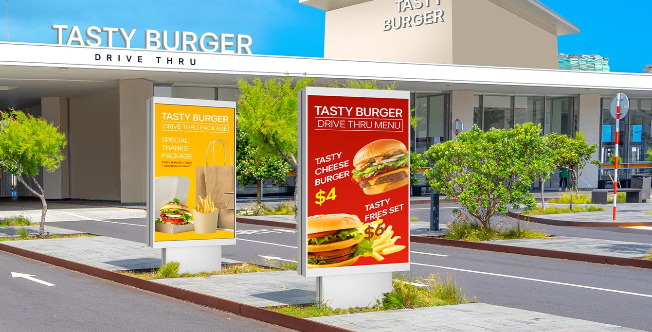 Two 75XF3P Open Frame 75 inch LED outdoor display screens in the drive-thru zone at the burger place.