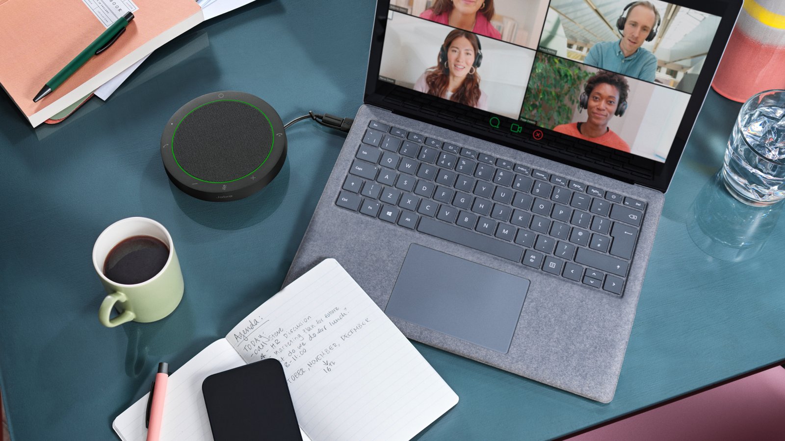 Jabra Speak2 40 UC Speakerphone – USB-A & USB-C 3 Jabra Speak2 40 UC — portable speakerphone in use at a home office desk