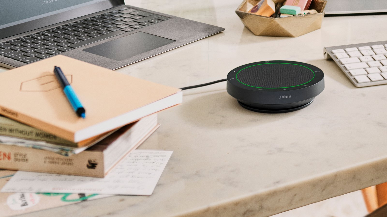 Jabra Speak2 40 UC Speakerphone – USB-A & USB-C 7 Jabra Speak2 40 — compact puck design on desk